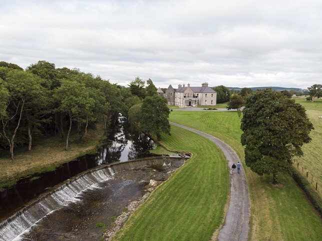 Aerial view of the river and house